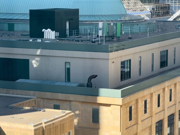 5G cellular antennas installed on a city rooftop