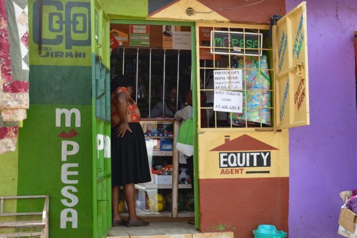 M-PESA mobile money and Equity Bank agent kiosk in Nairobi, Kenya