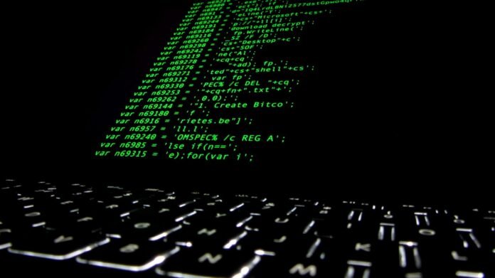 Ransomware source code displayed on a computer screen