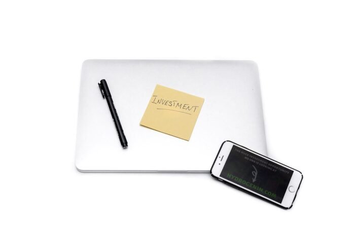 Laptop and smartphone on a desk, representing online freelance payments